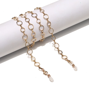 Minimalist gold metal glasses chain with circular links and silicone loop connectors