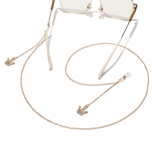 Golden eyewear chain featuring sparkling rhinestone crown pendants and anti-slip loops