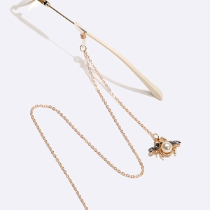 Gouden metalen brillenketting met parel kristallen bijenhanger en siliconen lusjes