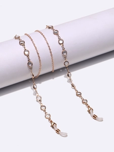 Minimalist gold alloy eyewear chain with transparent rhinestones and silicone loops