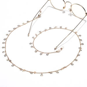 Chaîne à lunettes dorée avec étoiles ajourées et boucles de réglage en silicone blanc