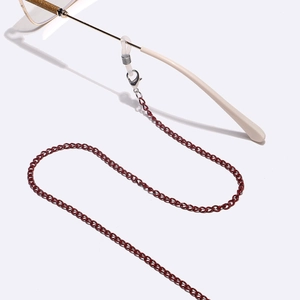 Non-slip deep red metal eyewear chain with silver lobster clasps on white background