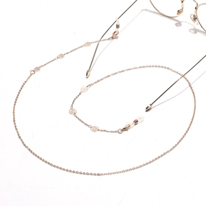 Elegant gold hollow rose eyewear chain with silicone loops for sunglasses and masks