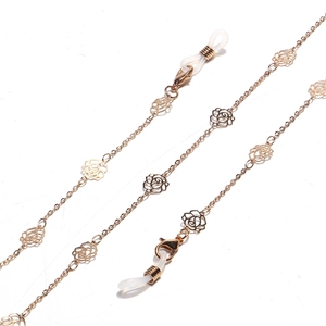 Golden eyewear chain with hollow rose charms and adjustable silicone ends for sunglasses