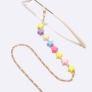 Golden eyewear chain with macaron star beads and silicone anti-slip loops on white background