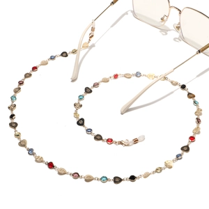 Golden heart-shaped metal glasses chain with colorful beads and rose patterns