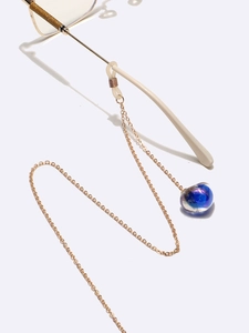 Chaîne de lunettes en métal doré avec pendentif cœur en verre bleu et bagues antidérapantes