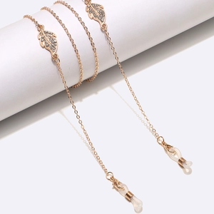 Gold leaf glasses chain with rhinestones and silicone loops on white display