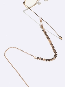 Minimalistische goldene Brillenkette aus Metall mit Herzanhängern und Gummischlaufen