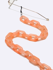 Chaîne de lunettes ovale orange en acrylique avec une texture gelée semi-transparente