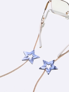 Golden eyewear chain with marble star pendants and non-slip loops on glasses