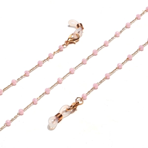 Detailed view of 2mm pink crystal beads and golden lobster clasp on glasses chain