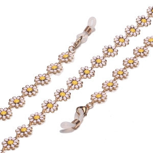 Golden daisy chain glasses strap with white floral charms and silicone grips