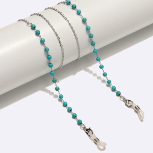 Detail of turquoise beads on stainless steel eyeglass chain with silver lobster clasp