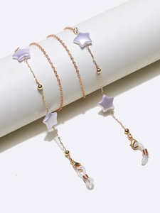 Chaîne de lunettes en or rose avec pendentifs étoiles nacrées mauves et boucles en silicone