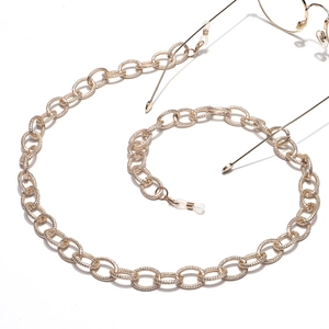 Fashionable gold chunky eyeglass chain with textured oval links and silicone loops