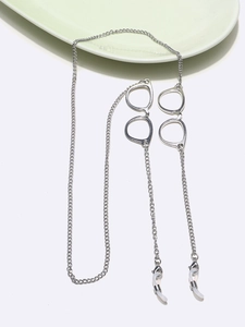 Chaîne de lunettes en métal argenté avec pendentif évidé et boucles antidérapantes