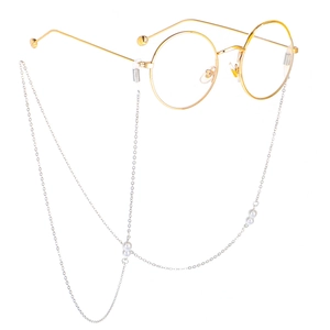 Fashionable gold metal round glasses with an elegant white pearl beaded silver chain