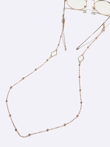 Fashion gold eyewear chain with geometric diamond elements and beads on a fine metal link