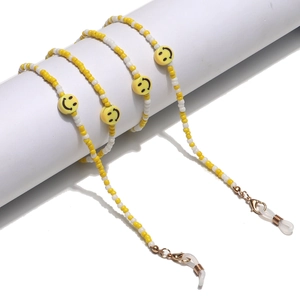 Colorful seed bead eyewear chain with yellow smiley faces and gold lobster clasps