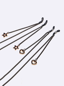 Set of 4 black metal eyewear chains with gold-rimmed star and heart charms for glasses