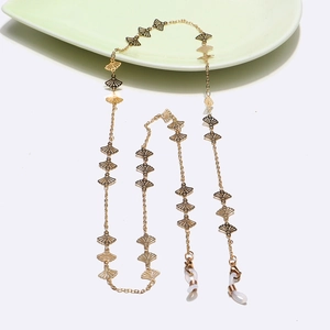 Golden fan-shaped hollow leaf eyewear chain for sunglasses with non-slip rubber rings