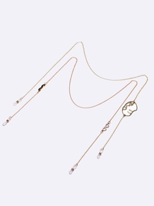 Gold and rose gold eyewear chains featuring unique beard and face silhouette pendants