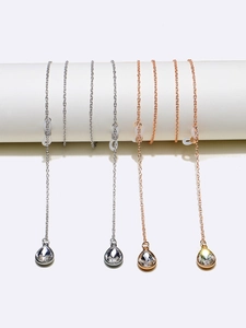 Two-piece set of gold and silver eyeglass chains with crystal teardrop pendants