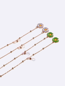 Daisy beaded glasses chains in white and green with gold metal link and silicone loops