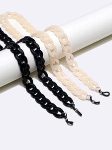 Set of four chunky acrylic eyewear chains in glossy black and pearlescent cream colors