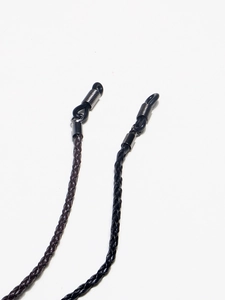 Two-piece braided leather eyewear chains in black and brown with secure metal clips