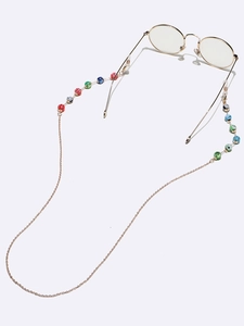 Chaîne de lunettes en métal doré avec perles colorées de 10mm sur un fond blanc