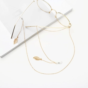 Chaîne de lunettes dorée avec pendentifs feuilles évidées et boucles antidérapantes