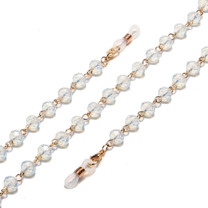 Handmade gold eyewear chain featuring white crystal beads and non-slip silicone loops