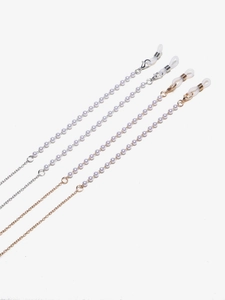 Detail of copper pearl glasses chains in gold and silver with silicone anti-slip loops