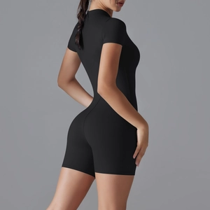 Rear view of black compression yoga romper showing high-stretch fabric and slim fit design