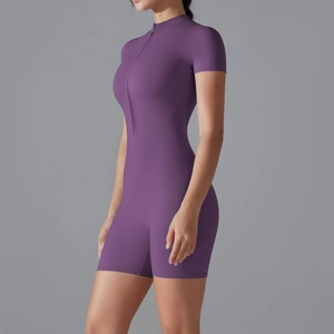 Close-up of side view showcasing the slim fit cut and texture of the purple yoga bodysuit