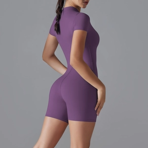 Detail of purple slim-fit yoga bodysuit featuring high-stretch fabric and seamless back