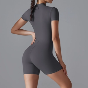 Close-up of dark grey zipper athletic bodysuit fabric and form-fitting yoga suit texture