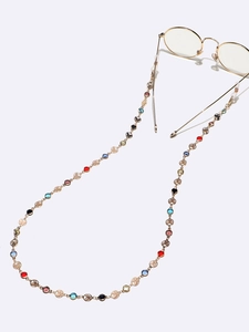 Golden eyewear chain with colorful stones and butterfly charms for fashion style