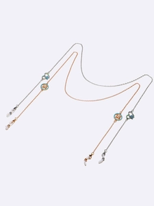 Two-piece eyeglass chain set with hollow heart pendants and turquoise accents in silver finish