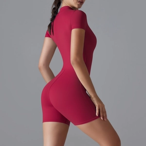 Close-up of red high-elasticity short sleeve yoga romper with stand collar and zipper detail