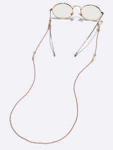 Gold metal eyewear chain with transparent crystal beads and anti-slip silicone loops