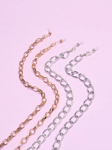 Macro shot of thick gold and silver chunky aluminum link eyewear chains for glasses