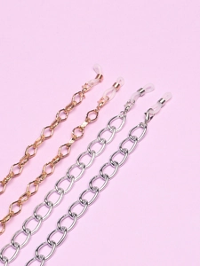 Close-up of gold and silver chunky aluminum eyeglass chains with silicone loops