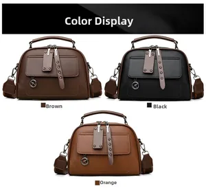 Three handbags in brown black and orange with wide woven straps and kangaroo charms