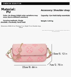 Pink PU crossbody bag with clover pattern, metal chain, and dimension labels