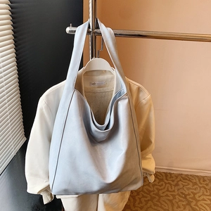 Minimalist light blue large capacity PU leather tote bag with wide shoulder strap