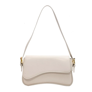 Chic milky white shoulder bag with irregular wavy flap and golden hardware accents