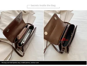 Detail view of the brown leather crossbody bag showing dual internal compartments and storage
